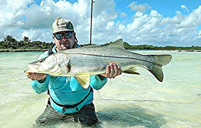 Joe Brennan had a banner day fishing the Yucatan coast in Mexico, catching 8 Snooks and 2 Jacks, all in 1 day, all on an Olive Pole Dancer.